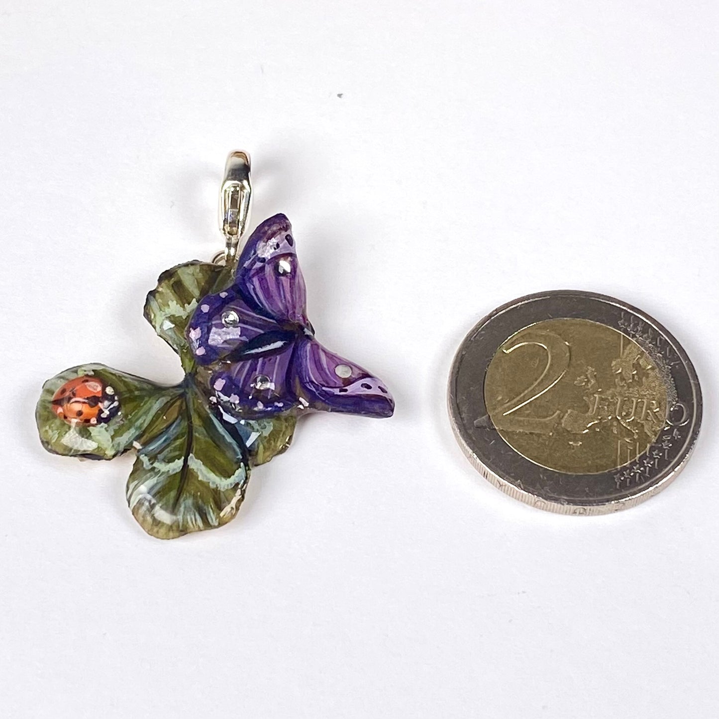 Ciondolo con quadrifoglio vero, coccinella e farfalla dipinte con gancio in argento N 02 fiori