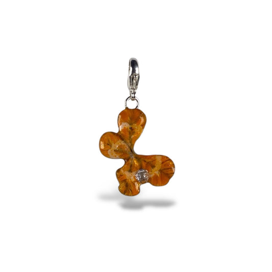 Chakra Svadhishthana, charm quadrifoglio, arancione con zircone.