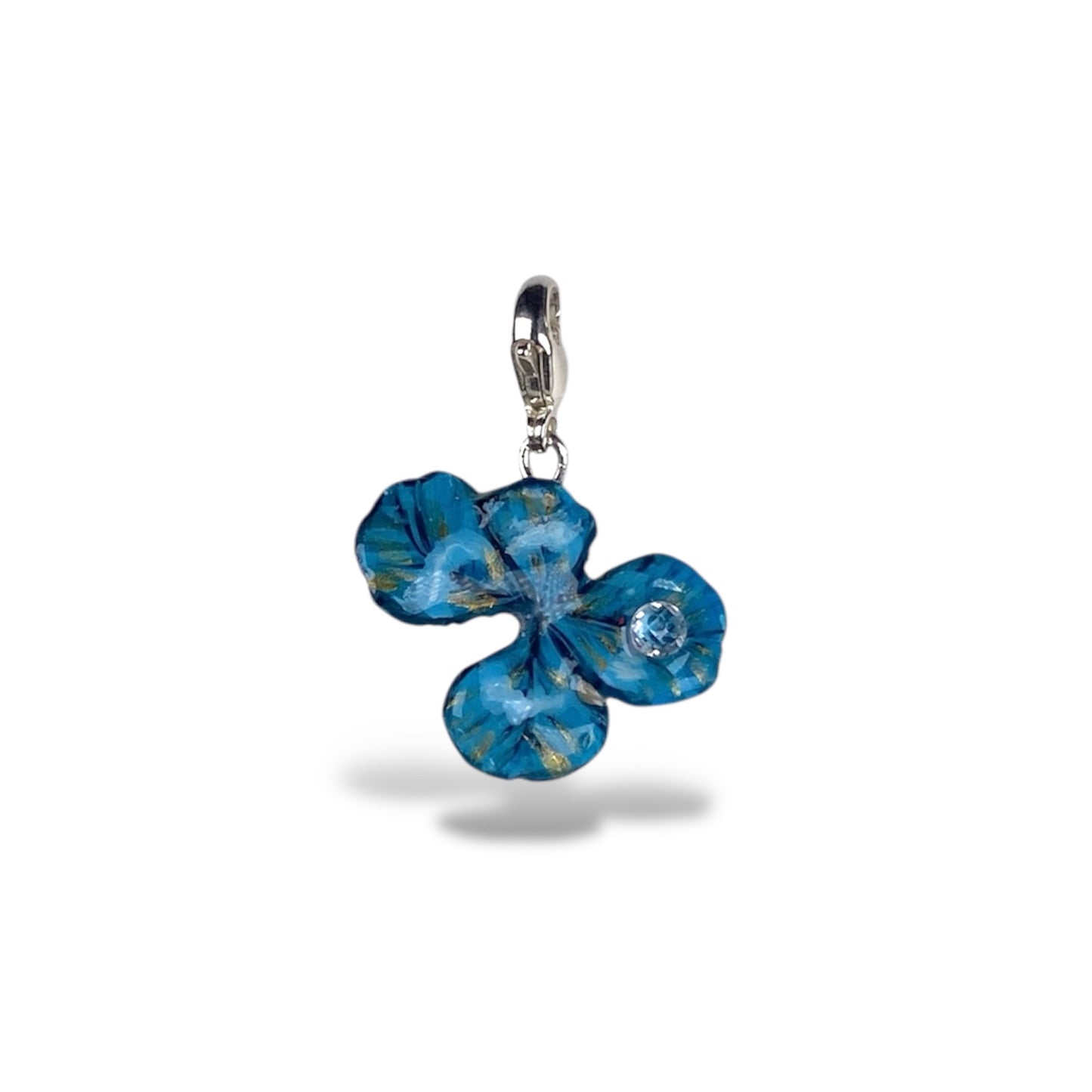 Chakra Vishuddha, ciondolo vero quadrifoglio, dipinto in azzurro e con zircone