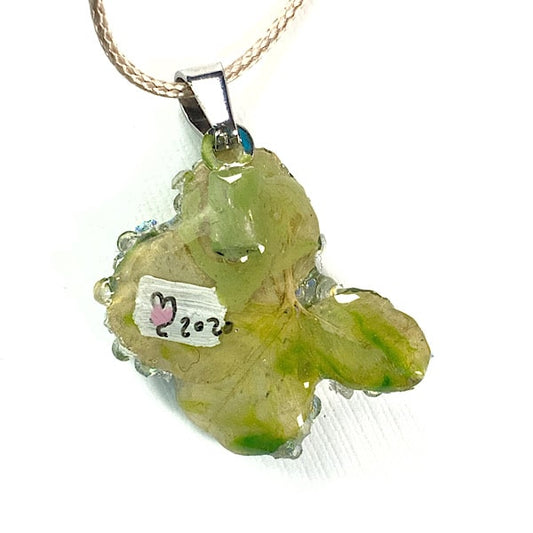 Ciondolo con brillantini e coccinella