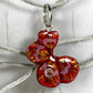Chakra Muladhara, charm con gancio in argento, quadrifoglio dipinto rosso con zircone.