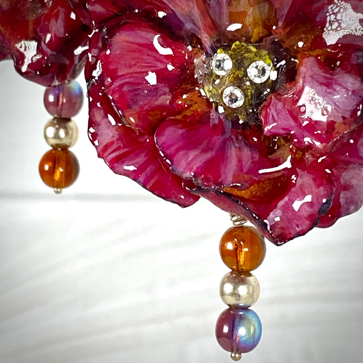 Parure floreale, con quadrifoglio portafortuna e catena in argento