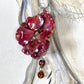 Orecchino in argento con rosa e perline